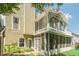 Exterior view of the home featuring a sunroom and a deck at 875 Soaring Cir, Marietta, GA 30062