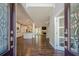 Inviting foyer with hardwood floors and an open floor plan, showcasing the kitchen and living spaces at 875 Soaring Cir, Marietta, GA 30062
