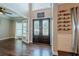 The foyer boasts hardwood floors, a double door entry and views into the dining room at 875 Soaring Cir, Marietta, GA 30062