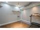 Home gym area with hardwood floors, recessed lighting, and a treadmill at 875 Soaring Cir, Marietta, GA 30062