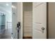 Hallway linen closet with multiple wire shelves for efficient storage and organization at 875 Soaring Cir, Marietta, GA 30062