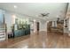 Open living area showcases a large aquarium, bar area, and hardwood floors at 875 Soaring Cir, Marietta, GA 30062