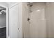 The bathroom features a bright shower with a showerhead and a white closet at 1696 Thomas St, Decatur, GA 30032