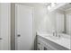 Bathroom features white vanity with modern sink and faucet, clean lighting and fixtures at 1696 Thomas St, Decatur, GA 30032