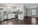 Renovated kitchen features stainless steel appliances and quartz countertops at 1696 Thomas St, Decatur, GA 30032