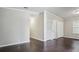 Inviting living room with dark wood floors and fresh neutral paint at 1696 Thomas St, Decatur, GA 30032