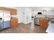 Bright kitchen featuring stainless steel appliances and wood cabinets at 245 Weatherstone Pointe Dr, Woodstock, GA 30188