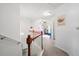 Bright hallway with charming decor and access to rooms at 245 Weatherstone Pointe Dr, Woodstock, GA 30188