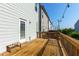 Spacious wooden deck ideal for entertaining and featuring a pet feeding station at 3057 Windover Ln, Kennesaw, GA 30144
