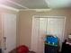 Bedroom featuring double windows, neutral walls and double door closet at 8564 Jamestown Way, Jonesboro, GA 30238