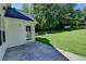 Large backyard with healthy green grass and trees at 969 Bob Hannah Cir, Lawrenceville, GA 30044