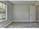 Bedroom featuring a window and wood-look flooring at 969 Bob Hannah Cir, Lawrenceville, GA 30044