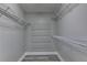 Walk-in closet with ample wire shelving for optimal storage and organization at 969 Bob Hannah Cir, Lawrenceville, GA 30044