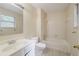 Neutral bathroom featuring a single sink, tile flooring, and a shower and tub combination at 1060 Heatherwood Ct, Norcross, GA 30093