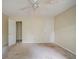Large bedroom with neutral carpet and ample closet space at 1060 Heatherwood Ct, Norcross, GA 30093