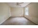 Bright bedroom with carpet, natural light and an en-suite bathroom at 1060 Heatherwood Ct, Norcross, GA 30093