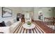 Bright living room with stylish decor, hardwood floors, and ample natural light, creating a warm and welcoming atmosphere at 1060 Heatherwood Ct, Norcross, GA 30093