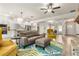 Well-lit living room offering seamless transition to kitchen and adjacent rooms at 2124 Bullock Bluff Dr, Loganville, GA 30052