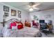 Stylish bedroom with a ceiling fan, wooden desk and chair, perfect for a home office at 2368 Glynn Se Dr, Atlanta, GA 30316