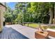 Large deck surrounded by beautiful mature trees at 2368 Glynn Se Dr, Atlanta, GA 30316