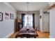 Elegant dining room with a chandelier, hardwood floors, and stylish decor at 2368 Glynn Se Dr, Atlanta, GA 30316