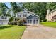 Charming two-story home with a well-maintained lawn and two-car garage at 2368 Glynn Se Dr, Atlanta, GA 30316