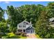 Charming two-story home with a well-manicured lawn and mature trees at 2368 Glynn Se Dr, Atlanta, GA 30316