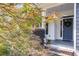 Inviting front porch entrance with a stylish blue door and beautiful landscaping at 2368 Glynn Se Dr, Atlanta, GA 30316