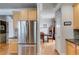 Spacious kitchen with stainless steel refrigerator and view into dining area at 2368 Glynn Se Dr, Atlanta, GA 30316