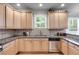 Bright kitchen featuring granite countertops, stainless steel appliances, and ample cabinet space at 2368 Glynn Se Dr, Atlanta, GA 30316
