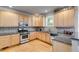 Charming kitchen with stainless appliances, granite counters, and lots of cabinet space at 2368 Glynn Se Dr, Atlanta, GA 30316