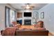 Inviting living room with a fireplace, hardwood floors, and stylish decor at 2368 Glynn Se Dr, Atlanta, GA 30316