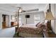Bedroom with ceiling fan, bed, furniture, and window allowing natural light to flood in at 2368 Glynn Se Dr, Atlanta, GA 30316