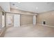 Finished basement with multiple doors, recessed lighting, and wall heating at 307 Heritage Overlook, Woodstock, GA 30188