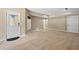 Finished basement with tiled and carpeted flooring, a door, and a window at 307 Heritage Overlook, Woodstock, GA 30188