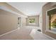 Finished basement with natural light, carpet, and ceramic flooring at 307 Heritage Overlook, Woodstock, GA 30188