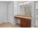 Granite countertop vanity and shower of a bathroom featuring neutral paint and tile flooring at 307 Heritage Overlook, Woodstock, GA 30188