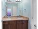 Bathroom featuring double sinks, granite countertops, and ample lighting at 307 Heritage Overlook, Woodstock, GA 30188