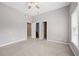 Spacious bedroom with a vaulted ceiling, two closets, and natural light at 307 Heritage Overlook, Woodstock, GA 30188