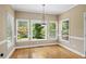 Bright breakfast room with large windows, perfect for enjoying casual meals with a view of the outdoors at 307 Heritage Overlook, Woodstock, GA 30188