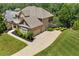 Beautiful brick home featuring a two-car garage and well-maintained landscaping at 307 Heritage Overlook, Woodstock, GA 30188