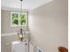 Elegant foyer featuring a view from the top of stairs with decorative light at 307 Heritage Overlook, Woodstock, GA 30188