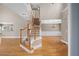 Grand foyer with hardwood floors, staircase, and open layout to other rooms at 307 Heritage Overlook, Woodstock, GA 30188