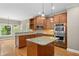 Modern kitchen with granite countertops and stainless steel appliances, ideal for cooking and entertaining at 307 Heritage Overlook, Woodstock, GA 30188