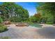 Stunning pool and spa area with stone accents and ample patio space for relaxation and recreation at 307 Heritage Overlook, Woodstock, GA 30188