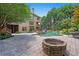 Resort-style pool and fire pit offer a perfect outdoor living space for relaxation and entertaining at 307 Heritage Overlook, Woodstock, GA 30188