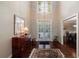 Elegant foyer with hardwood floors, chandelier, and tall ceilings at 1020 Matheson Way, Johns Creek, GA 30022