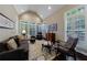 Bright and airy living room with hardwood floors and plantation shutters at 1020 Matheson Way, Johns Creek, GA 30022