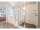 Bathroom features glass shower, garden tub and white tile at 1878 Weston Ln, Tucker, GA 30084