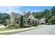 Charming gray clubhouse featuring manicured landscaping and inviting architecture at 1878 Weston Ln, Tucker, GA 30084